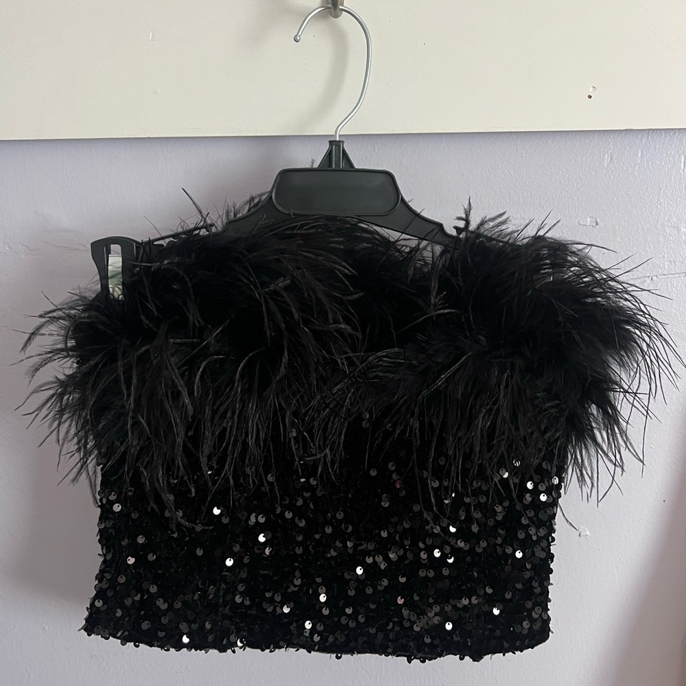 Line and dot sparkle and feather top.